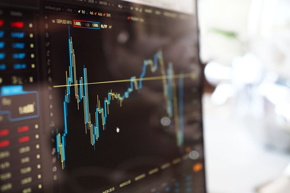 Financial data charts on a screen
